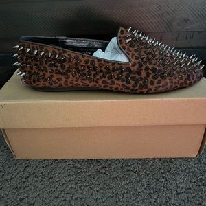 Unit size 9 pony hair leather loafers.